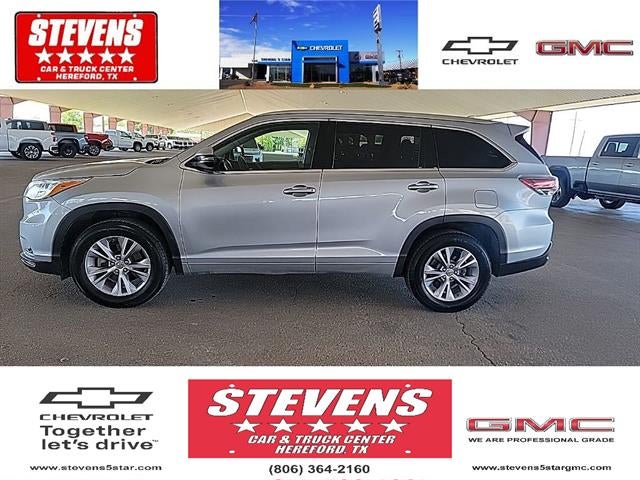 2015 Toyota Highlander XLE in Silver Sky Meta — front three-quarter view